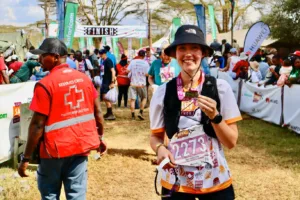 Isabella With Medal At Finish Line Credit Micheil Macdonald